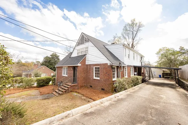 a view of a house with a patio
