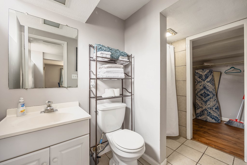 1620 Springer Street Columbus, GA 31901 - Photo 41 of 41 a bathroom with a toilet sink vanity and granite