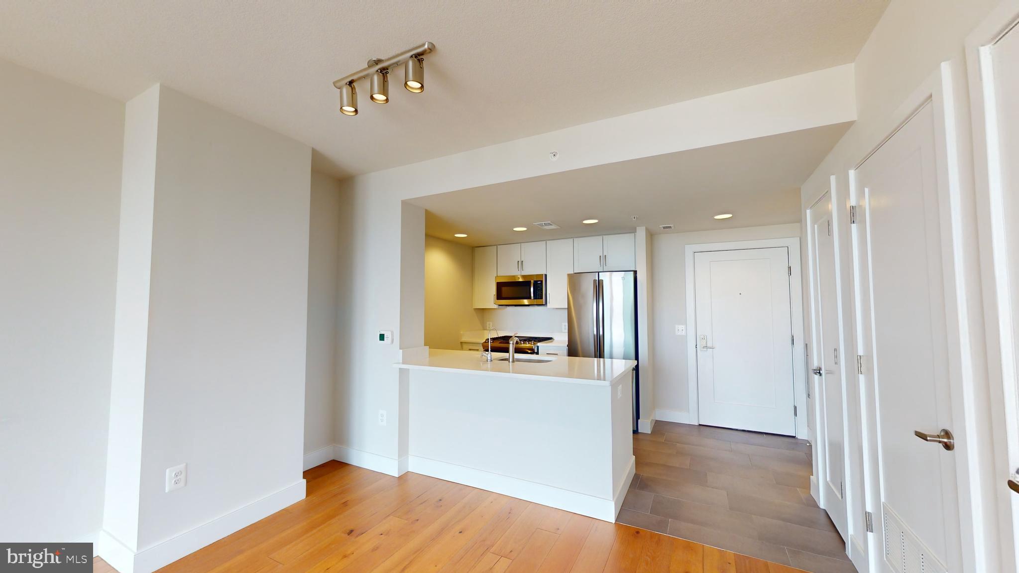 50 Florida Avenue Northeast, Unit 823 Washington, DC 20002 - Photo 2 of 12 a view of a kitchen with a sink and cabinets
