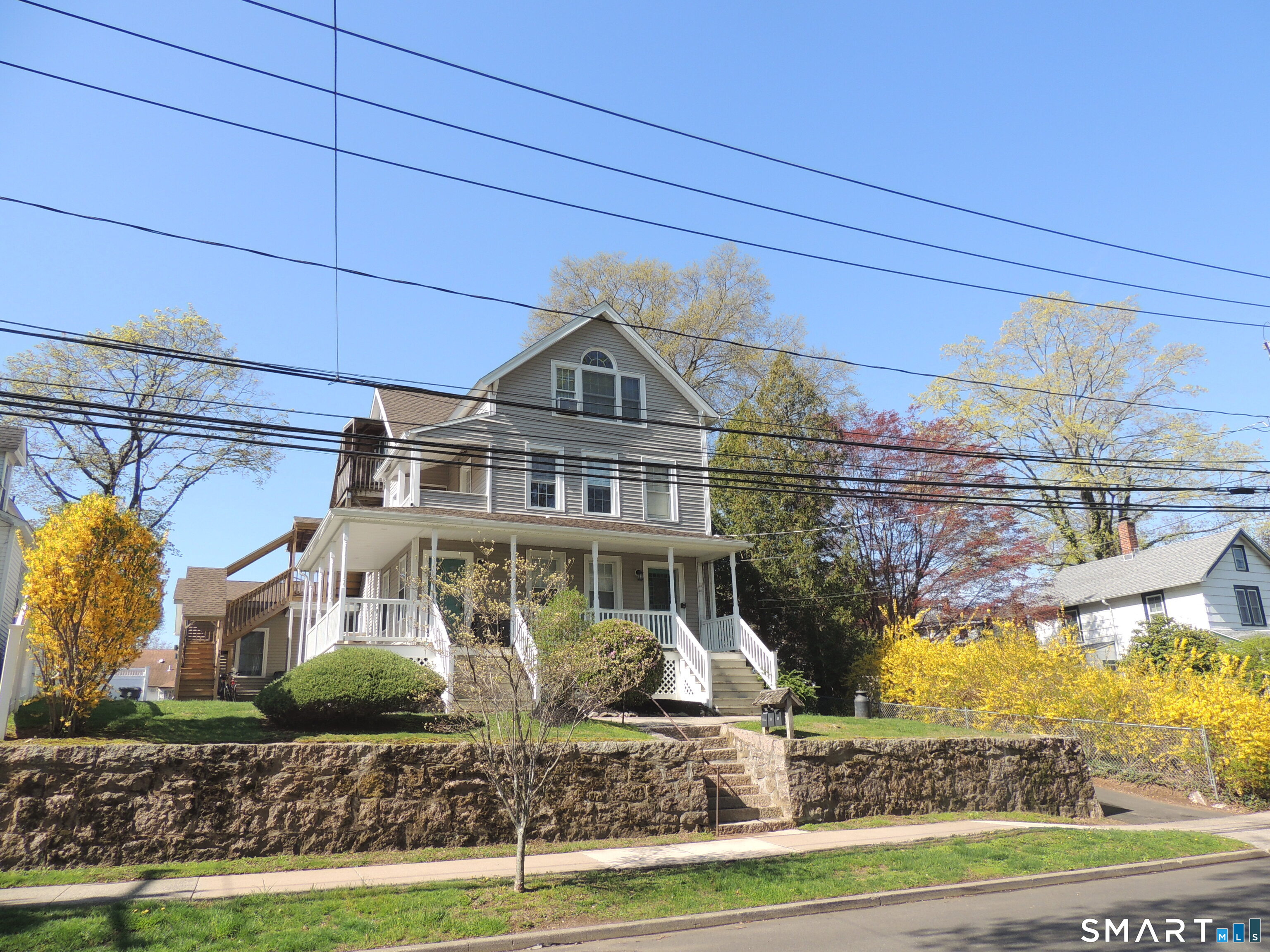 56-58 Harrison Avenue, Unit 2 Branford, CT 06405 - Photo 2 of 39 Charming, in-town three family!