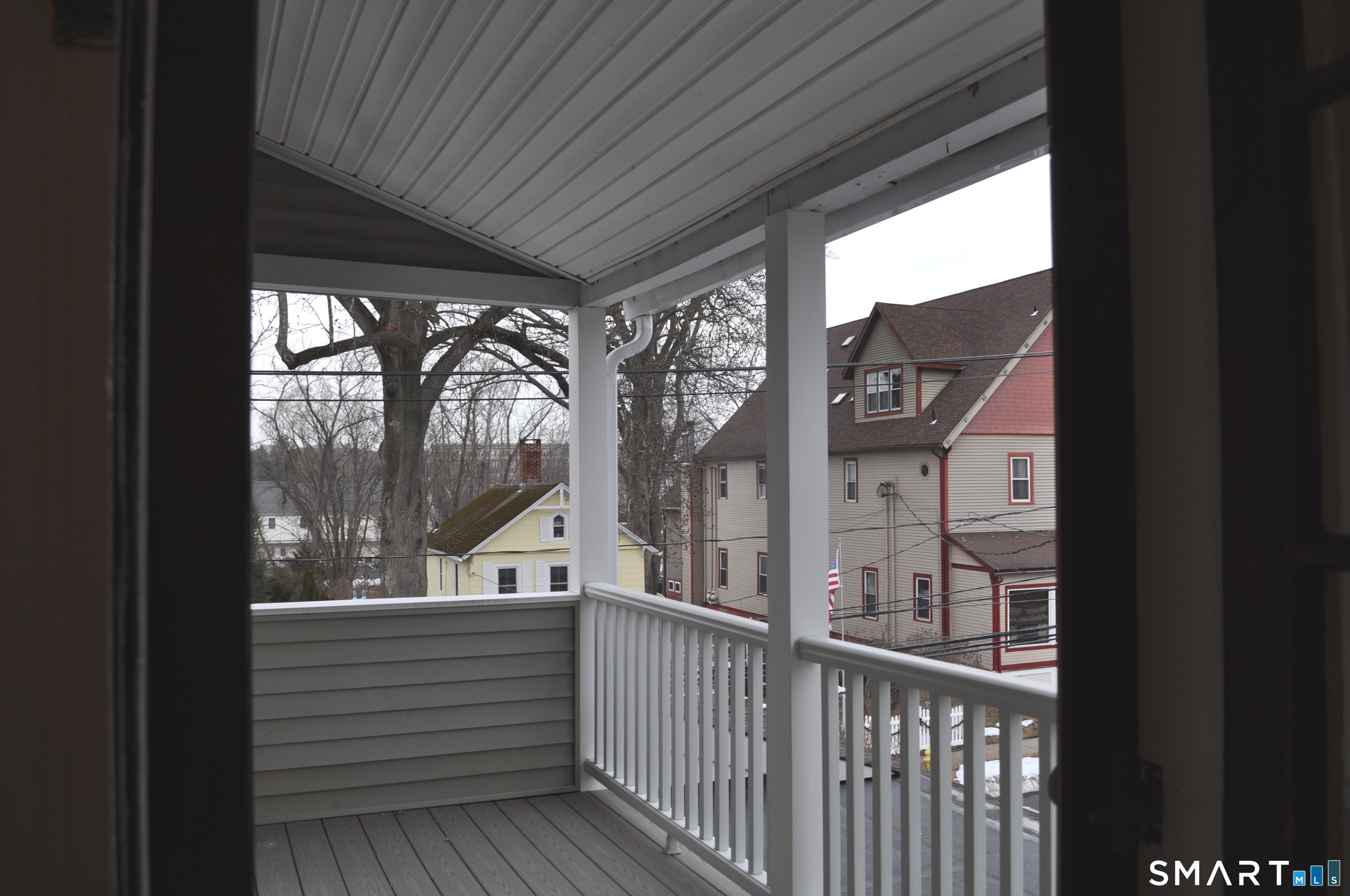 56-58 Harrison Avenue, Unit 2 Branford, CT 06405 - Photo 27 of 39 a view of a two chair in the balcony