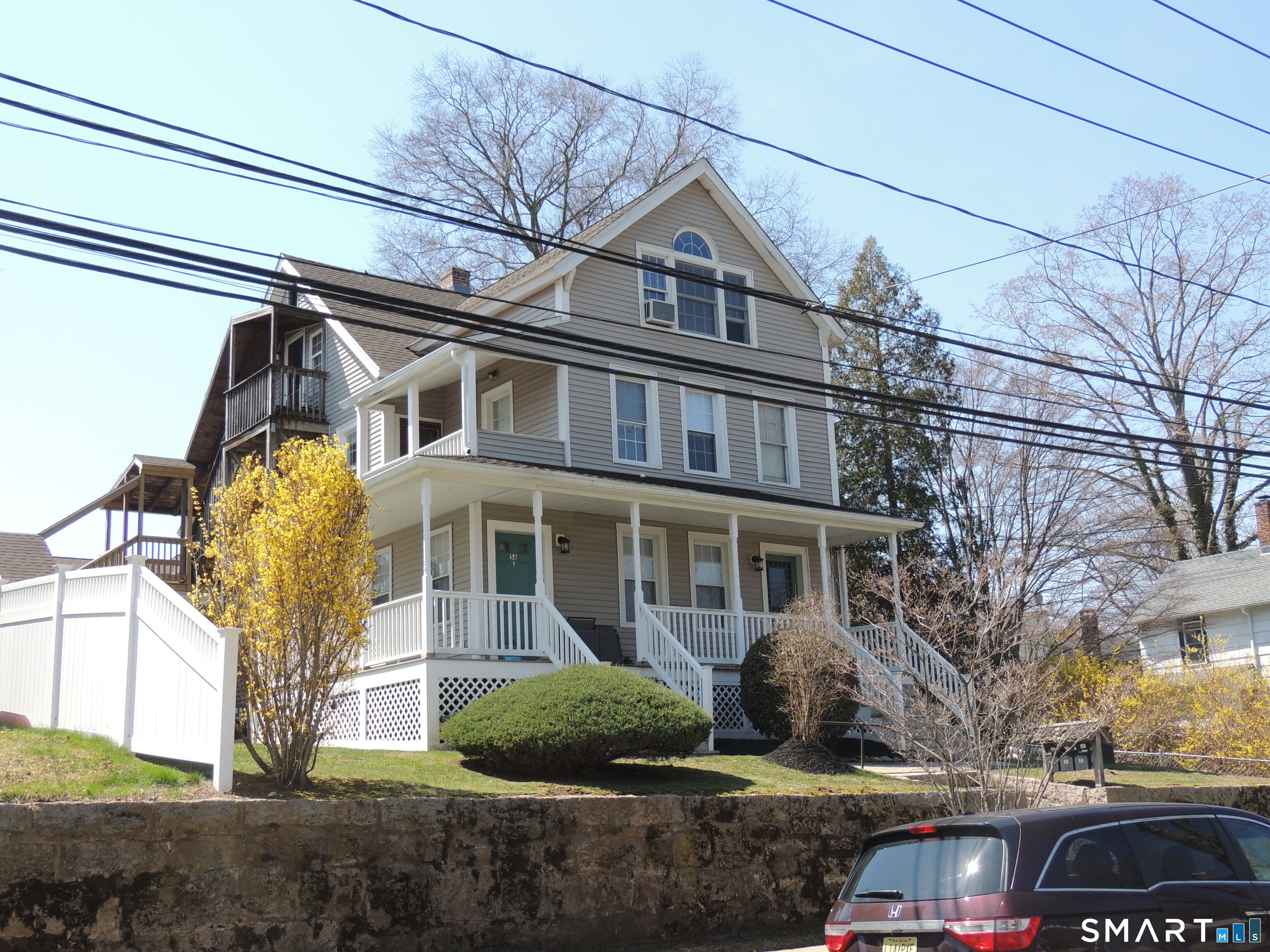 56-58 Harrison Avenue, Unit 2 Branford, CT 06405 - Photo 30 of 39 a front view of a house