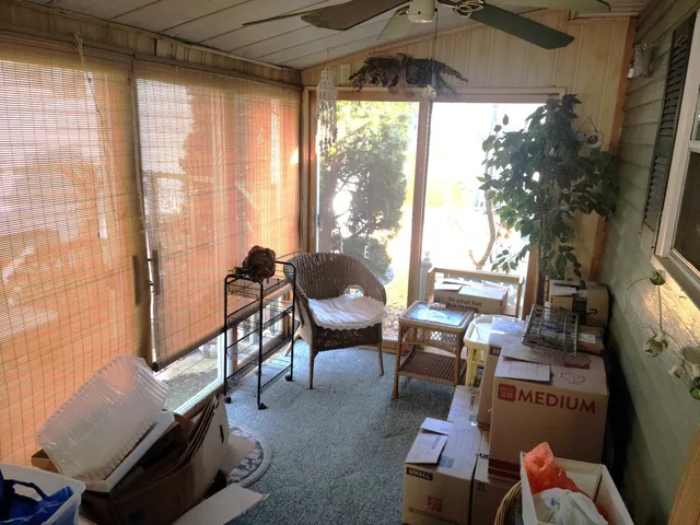 a living room with a couch swing