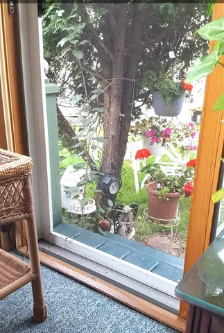 a view of a patio with chair and table