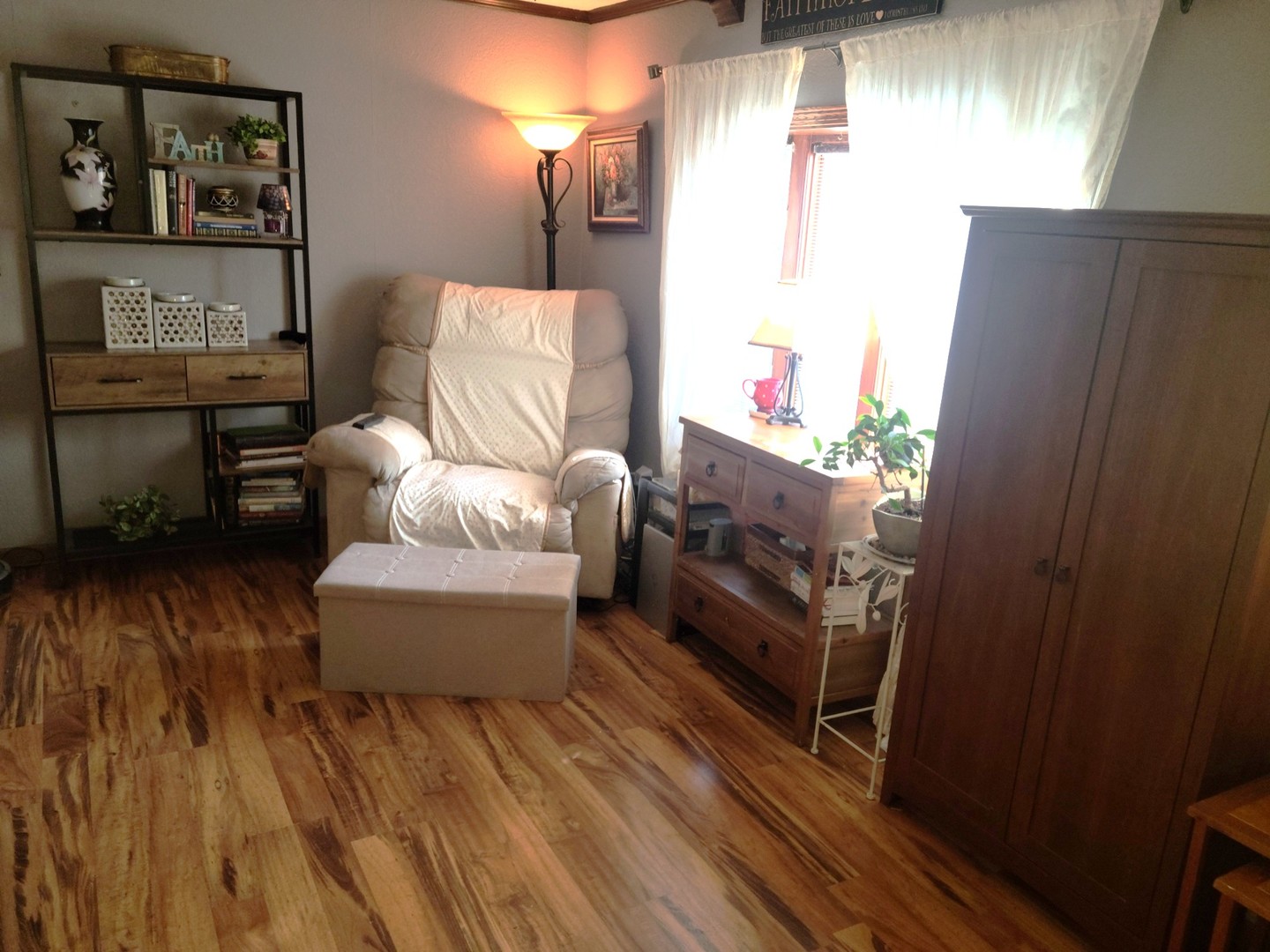6801 South La Grange Road Hodgkins, IL 60525 - Photo 3 of 26 a living room with furniture and a wooden floor