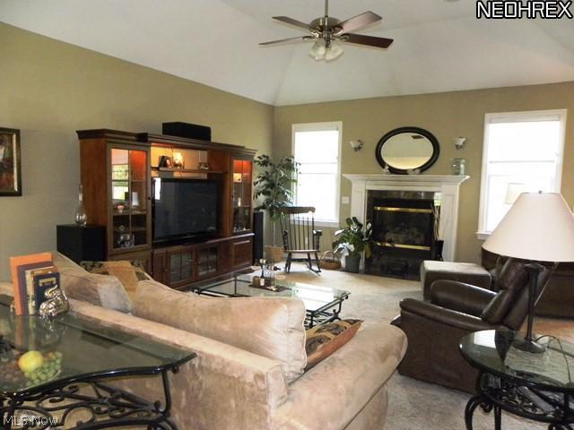 11581 Riding Trail Painesville, OH 44077 - Photo 2 of 20 Great room accented with tray ceiling and recessed lighting.