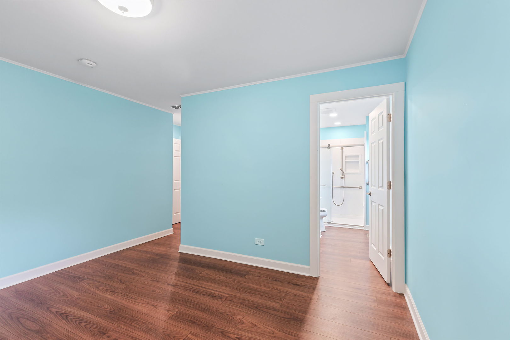 2404 George Street Rolling Meadows, IL 60008 - Photo 13 of 27 a view of an empty room with wooden floor