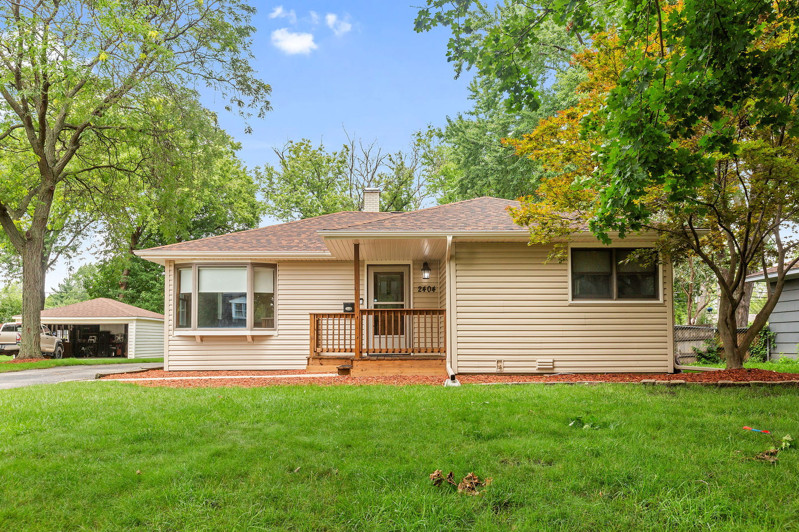 2404 George Street Rolling Meadows, IL 60008 - Photo 26 of 27 a front view of a house with a garden