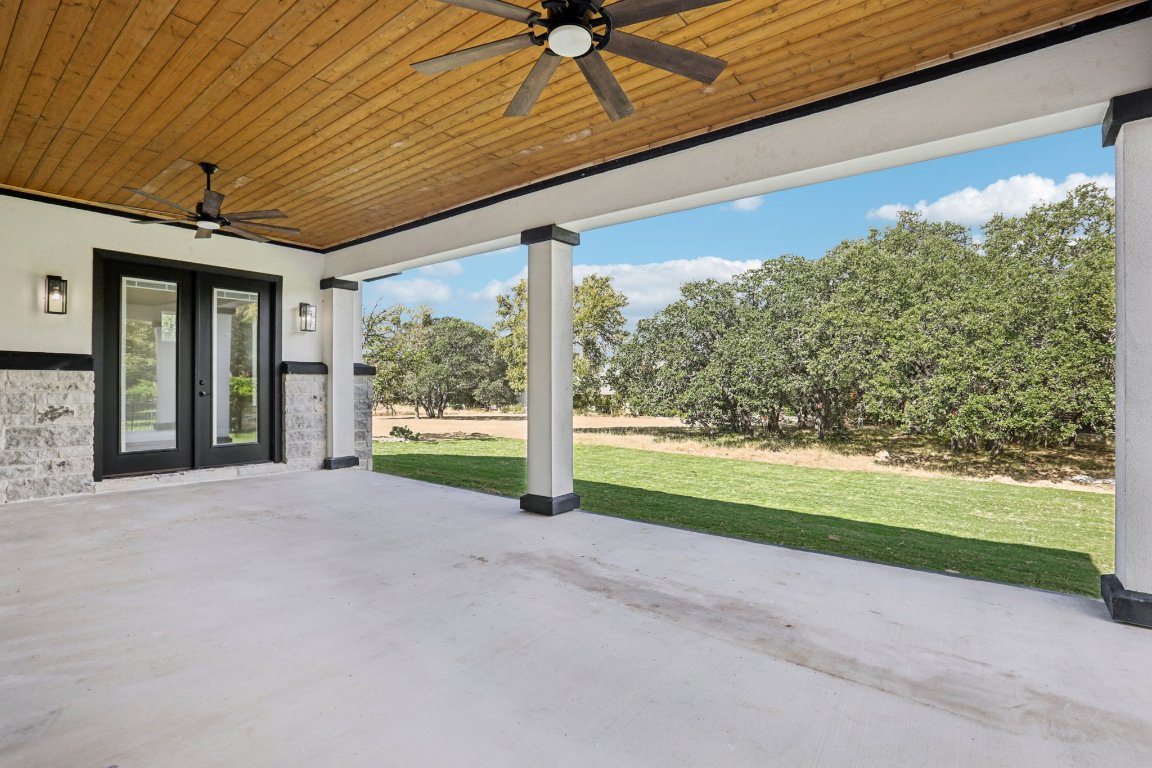 320 Yellow Ribbon Trail Burnet, TX 78611 - Photo 29 of 30 a view of a room with porch and wooden floor