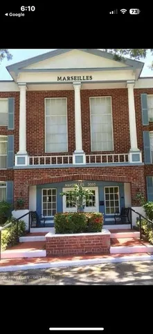 a view of swimming pool and a yard