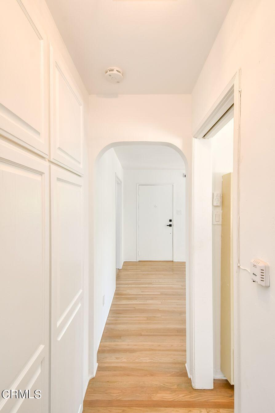 9730 1/2 Tujunga Canyon Boulevard Tujunga, CA 91042 - Photo 15 of 23 a view of a hallway with wooden floor