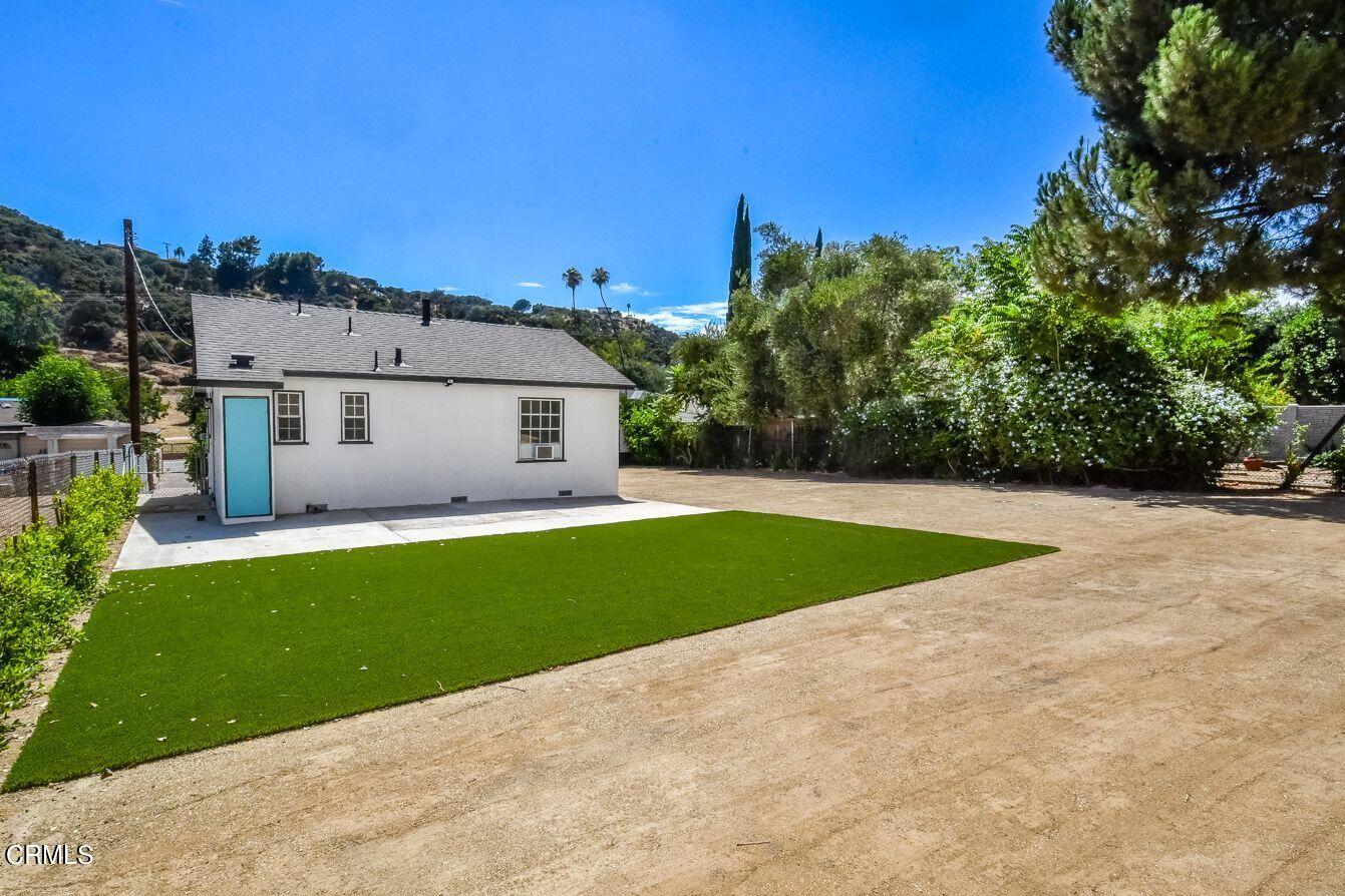9730 1/2 Tujunga Canyon Boulevard Tujunga, CA 91042 - Photo 19 of 23 a view of a house with a backyard