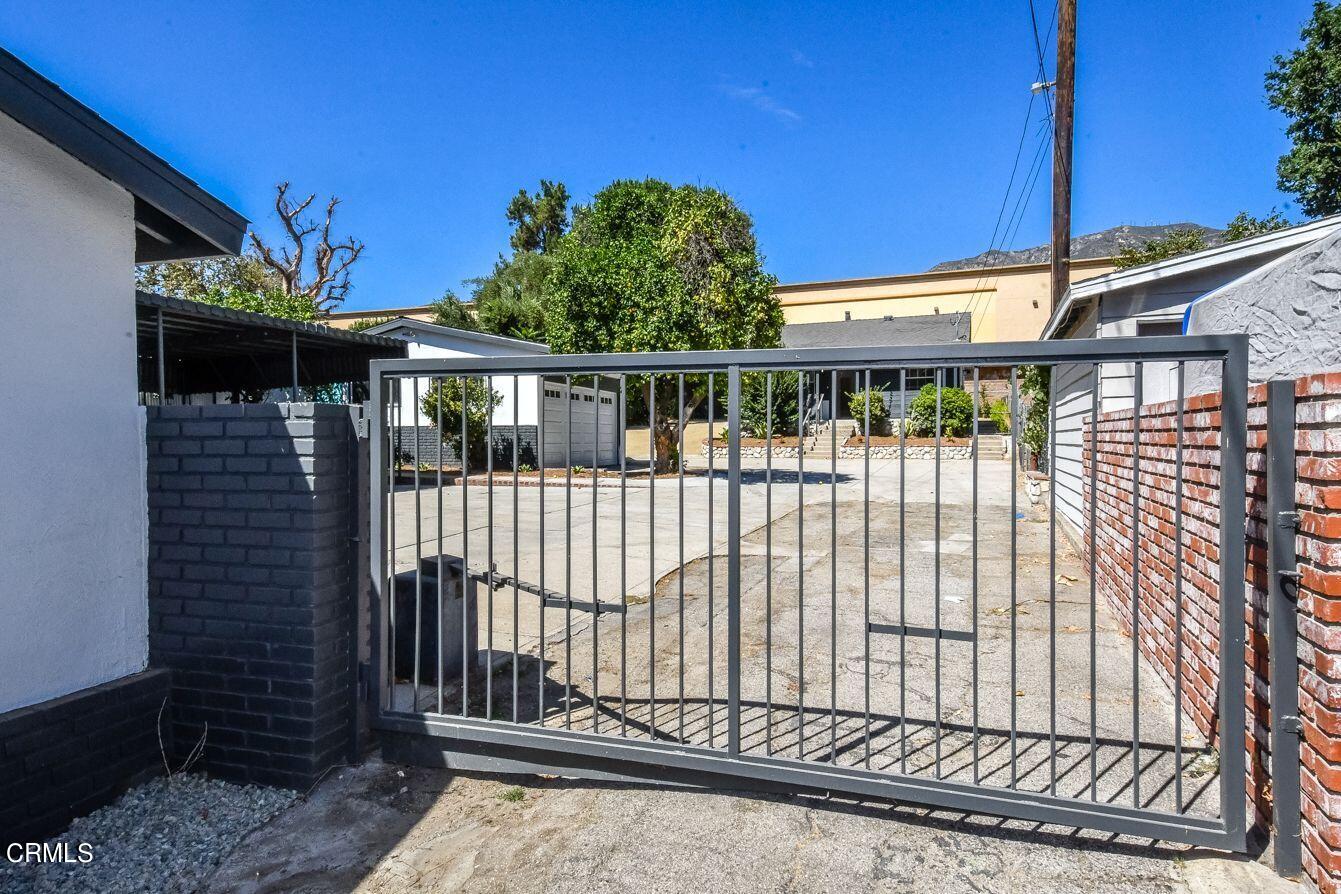 9730 1/2 Tujunga Canyon Boulevard Tujunga, CA 91042 - Photo 23 of 23 a view of a house with a iron gate