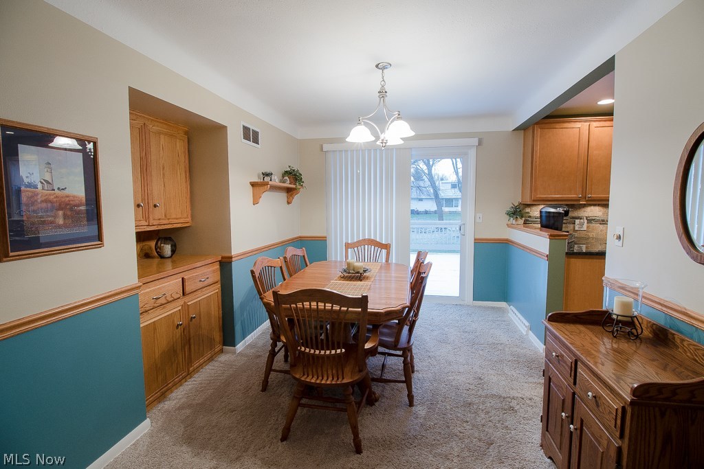 779 Edgewood Road Cleveland, OH 44143 - Photo 16 of 32 The Dining Room is open to the Kitchen and features a custom built-in serving area.