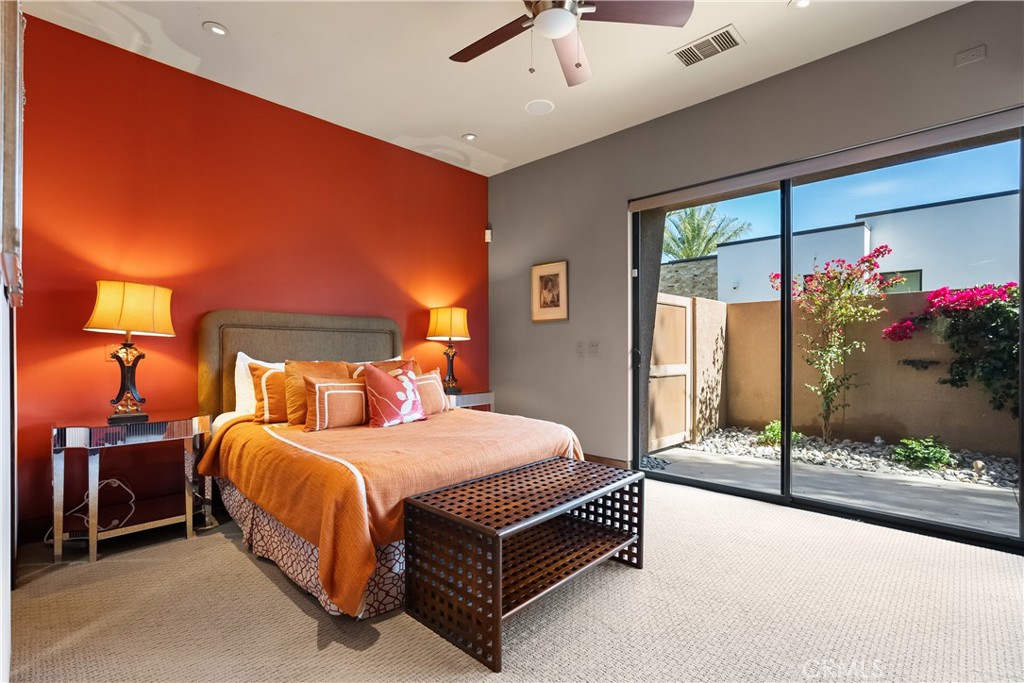 68 Royal St Georges Way Rancho Mirage, CA 92270 - Photo 66 of 75 a bedroom with a bed and window