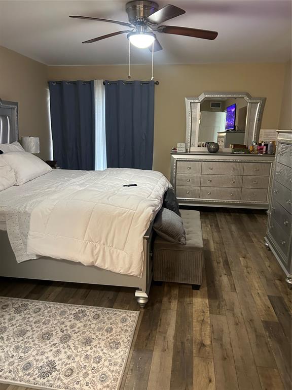 3521 Inverrary Drive, Unit J109 Lauderhill, FL 33319 - Photo 6 of 15 a bedroom with a bed and a dresser