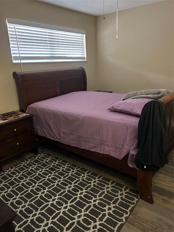 3521 Inverrary Drive, Unit J109 Lauderhill, FL 33319 - Photo 9 of 15 a bedroom with a bed and a window