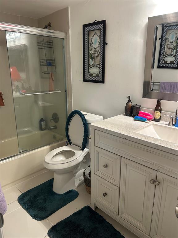 3521 Inverrary Drive, Unit J109 Lauderhill, FL 33319 - Photo 10 of 15 a bathroom with a sink toilet and shower