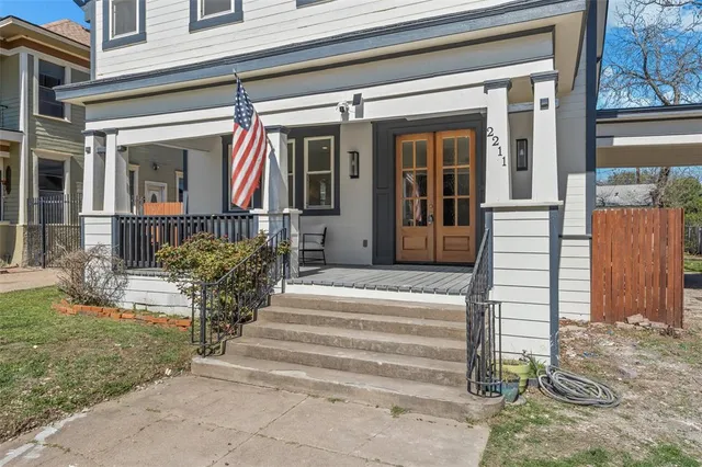 a front view of a house with a porch