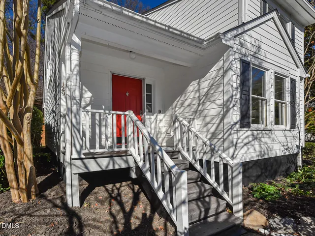 a view of stairs and a yard