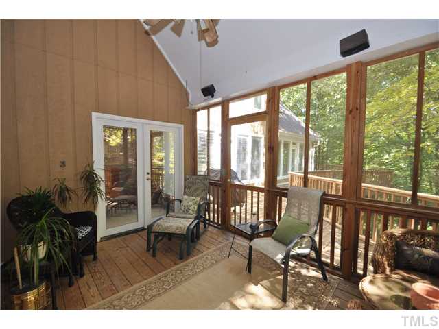 6424 Rushingbrook Drive Raleigh, NC 27612 - Photo 19 of 25 a living room with furniture and a large window