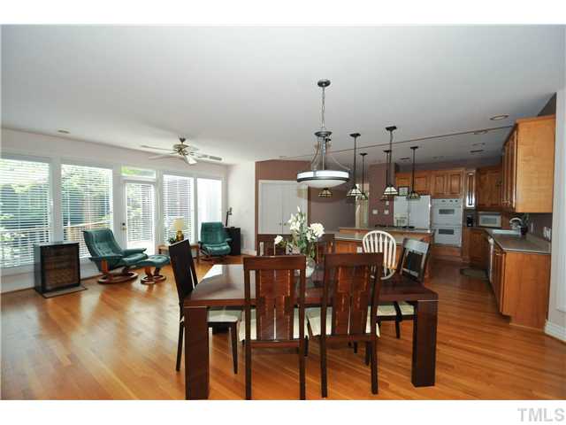 6424 Rushingbrook Drive Raleigh, NC 27612 - Photo 25 of 25 a view of a dining room with furniture window and wooden floor