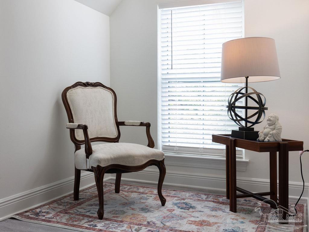 714 East La Rua Street Pensacola, FL 32501 - Photo 29 of 63 a view of a workspace room with furniture and a window