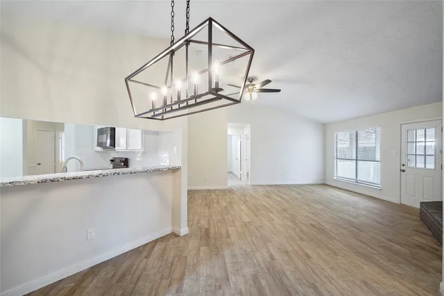 a view of a kitchen from a windows room