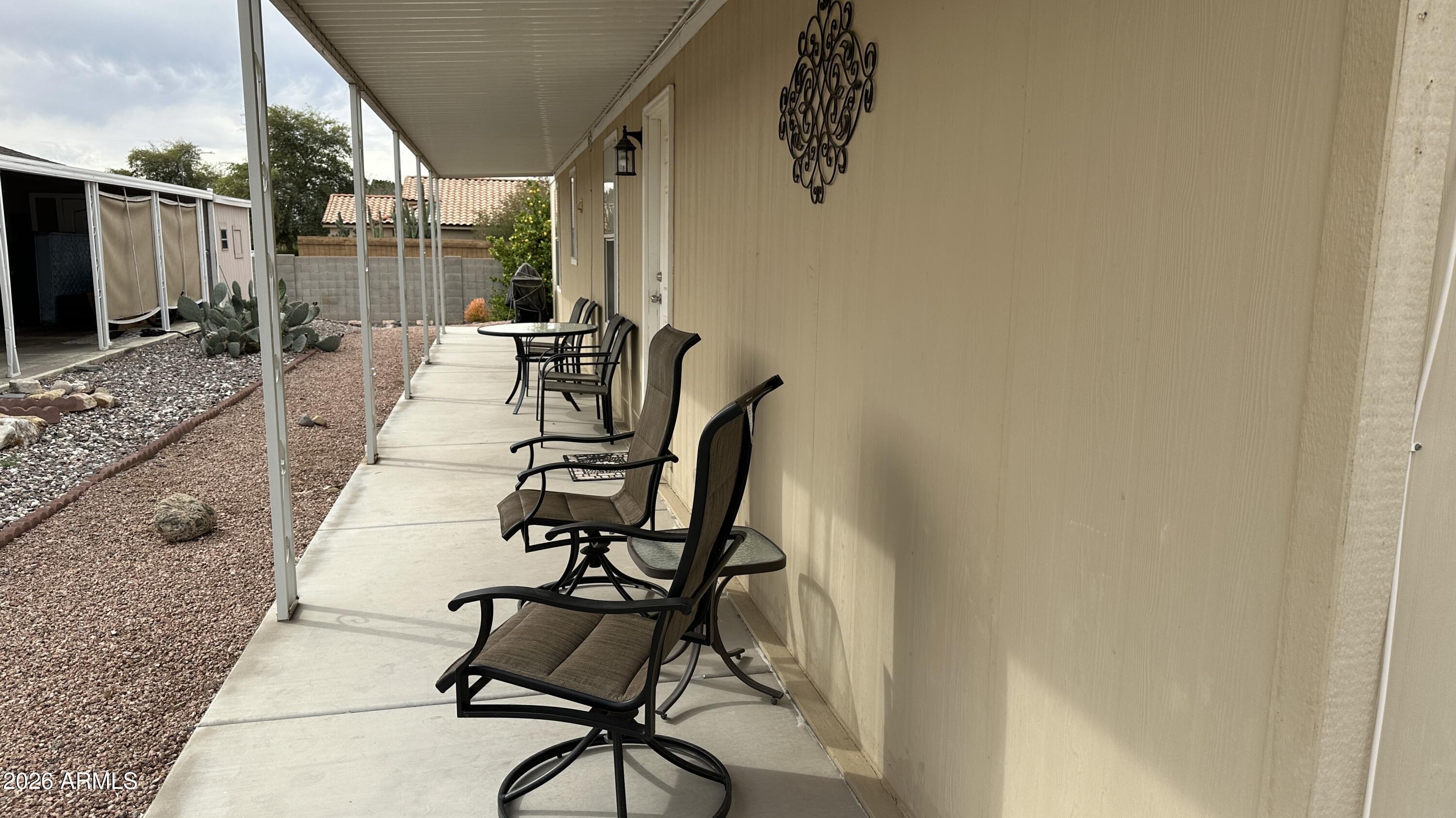 834 South Meridian Road, Unit 174 Apache Junction, AZ 85120 - Photo 13 of 56 a view of balcony with furniture