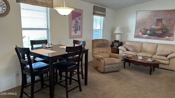 a kitchen with stainless steel appliances a refrigerator stove and sink