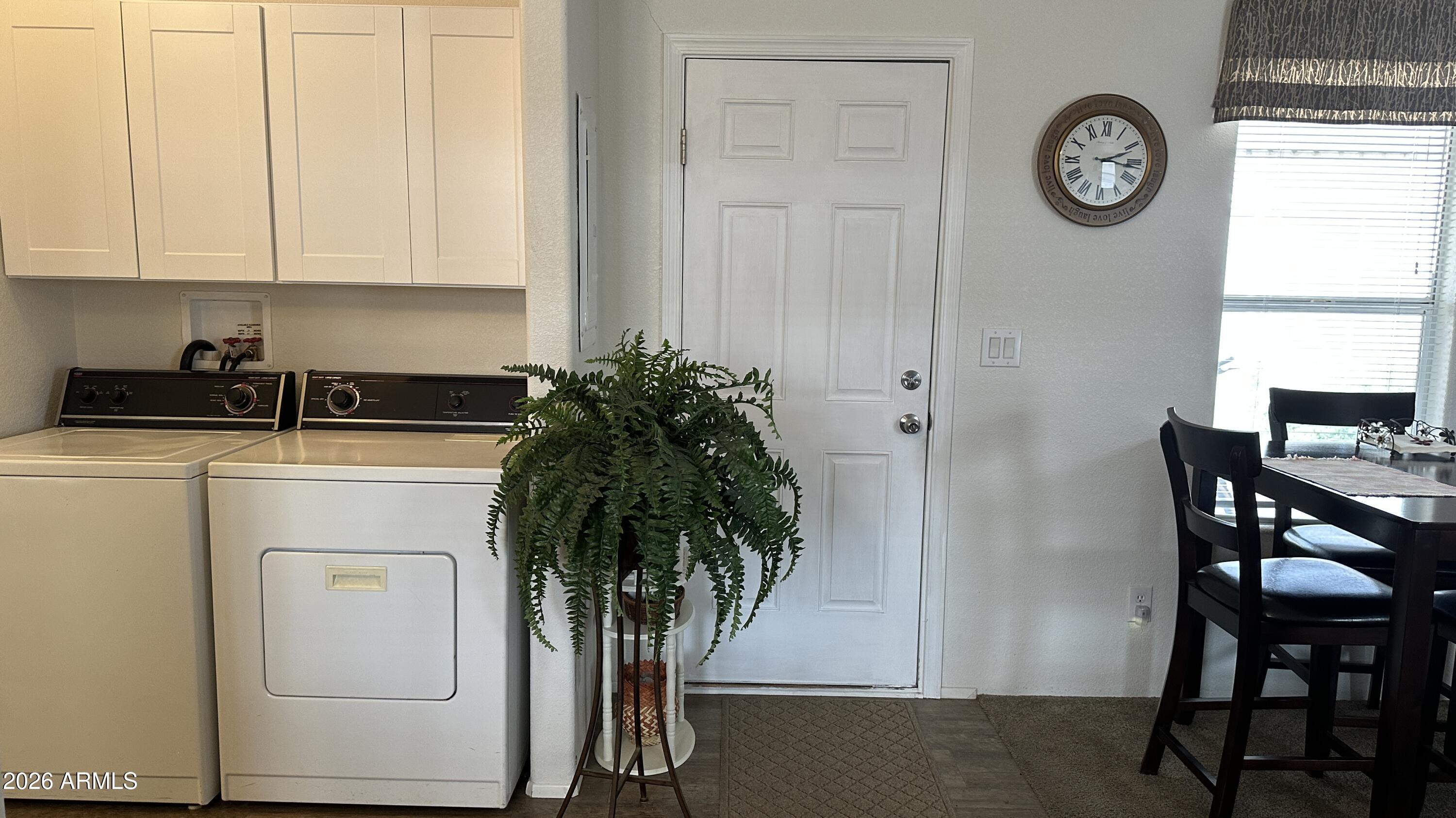 834 South Meridian Road, Unit 174 Apache Junction, AZ 85120 - Photo 43 of 56 a utility room with dryer and washer