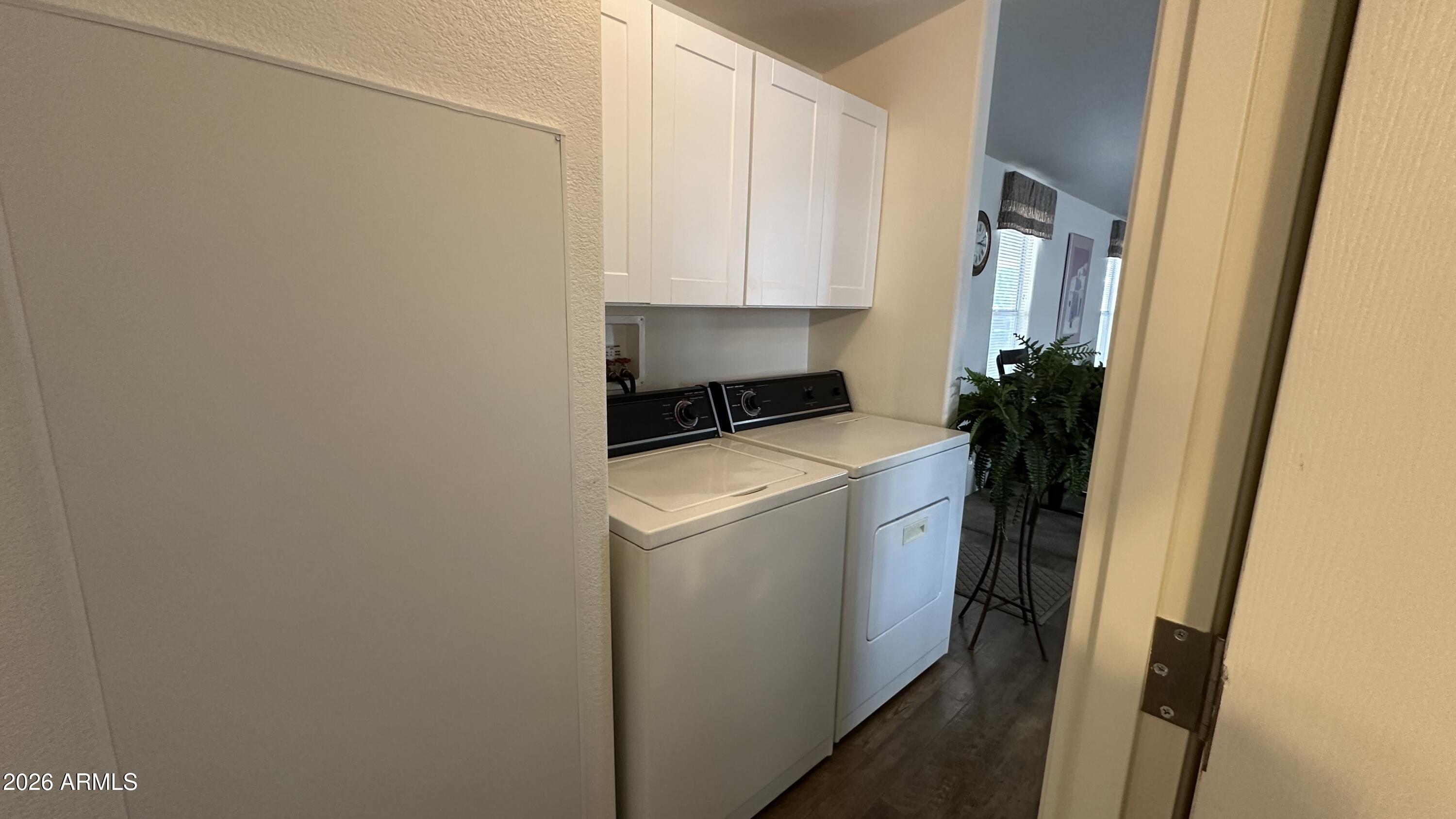 834 South Meridian Road, Unit 174 Apache Junction, AZ 85120 - Photo 44 of 56 a utility room with dryer and washer