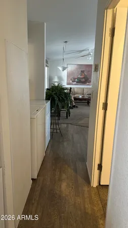 a living room with a couch and a window