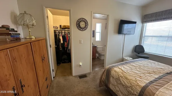 a picture of a bathroom with a sink and a mirror