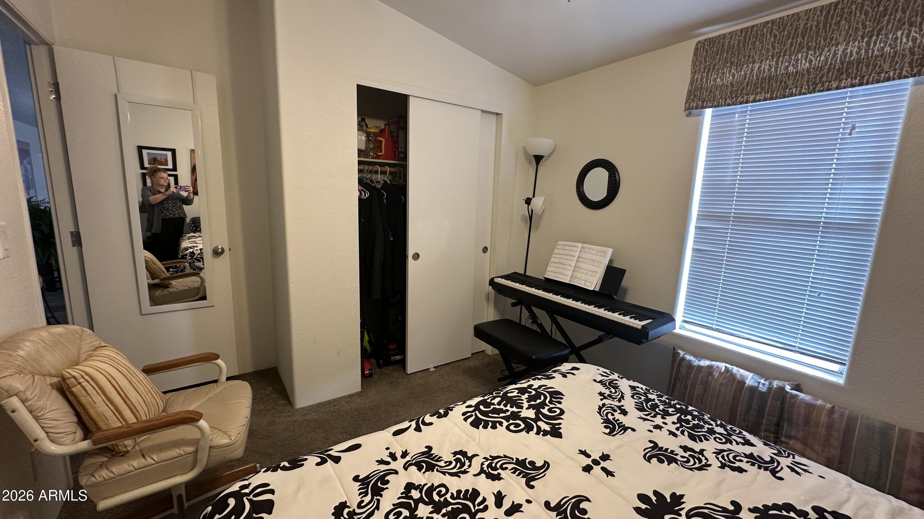 834 South Meridian Road, Unit 174 Apache Junction, AZ 85120 - Photo 51 of 56 a living room with a couch and a window