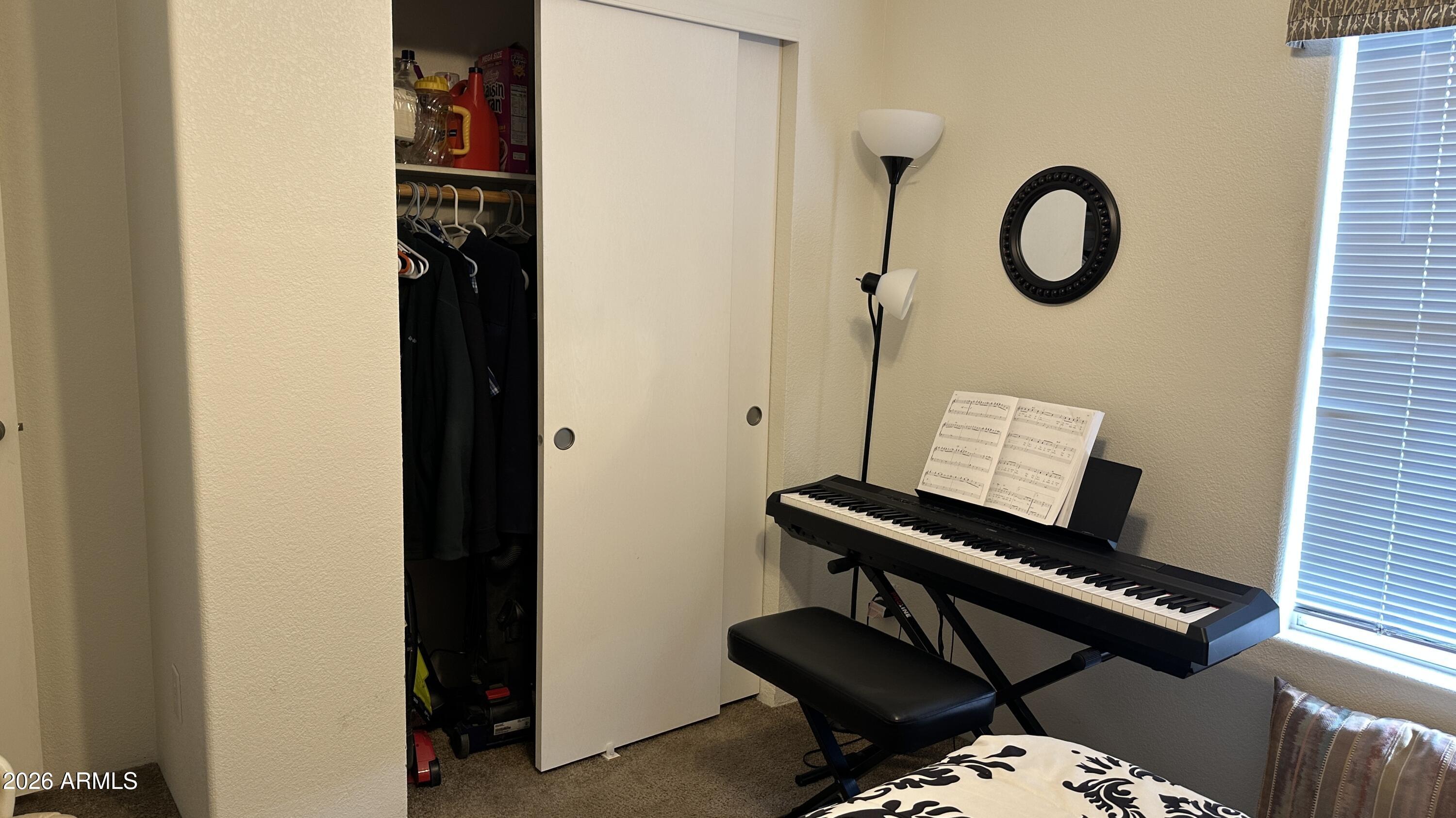 834 South Meridian Road, Unit 174 Apache Junction, AZ 85120 - Photo 54 of 56 a picture of a bathroom with a sink and a mirror