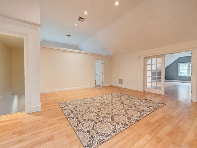 wooden floor in an empty room with window and wooden floor