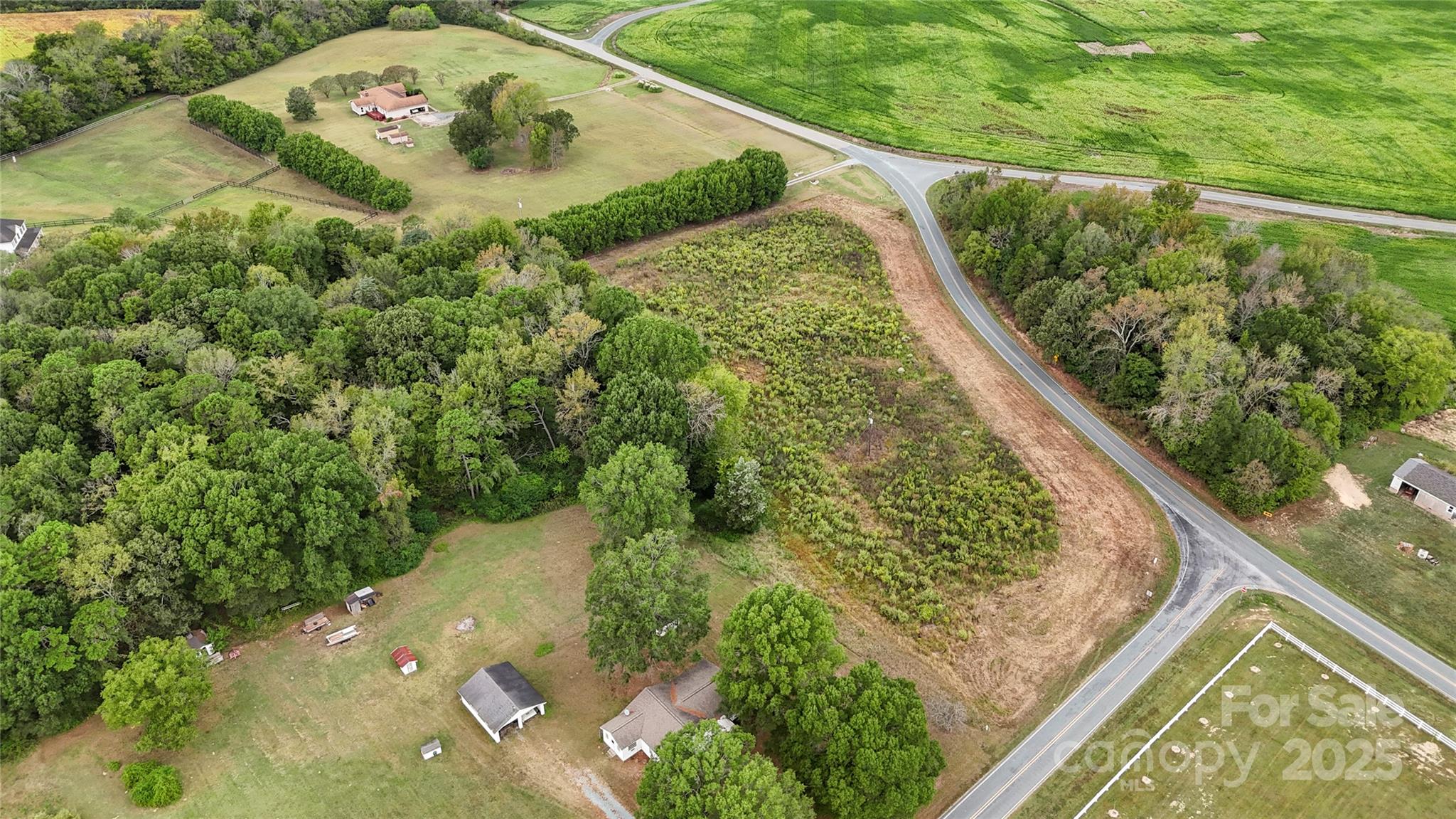 0 Snyders Store Road Wingate, NC 28174 - Photo 11 of 20 a view of a garden with a bench