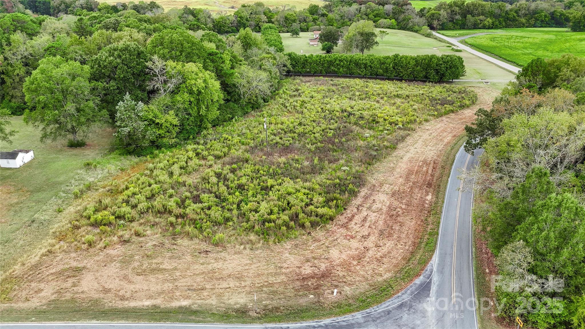 0 Snyders Store Road Wingate, NC 28174 - Photo 16 of 20 a view of a garden with a yard