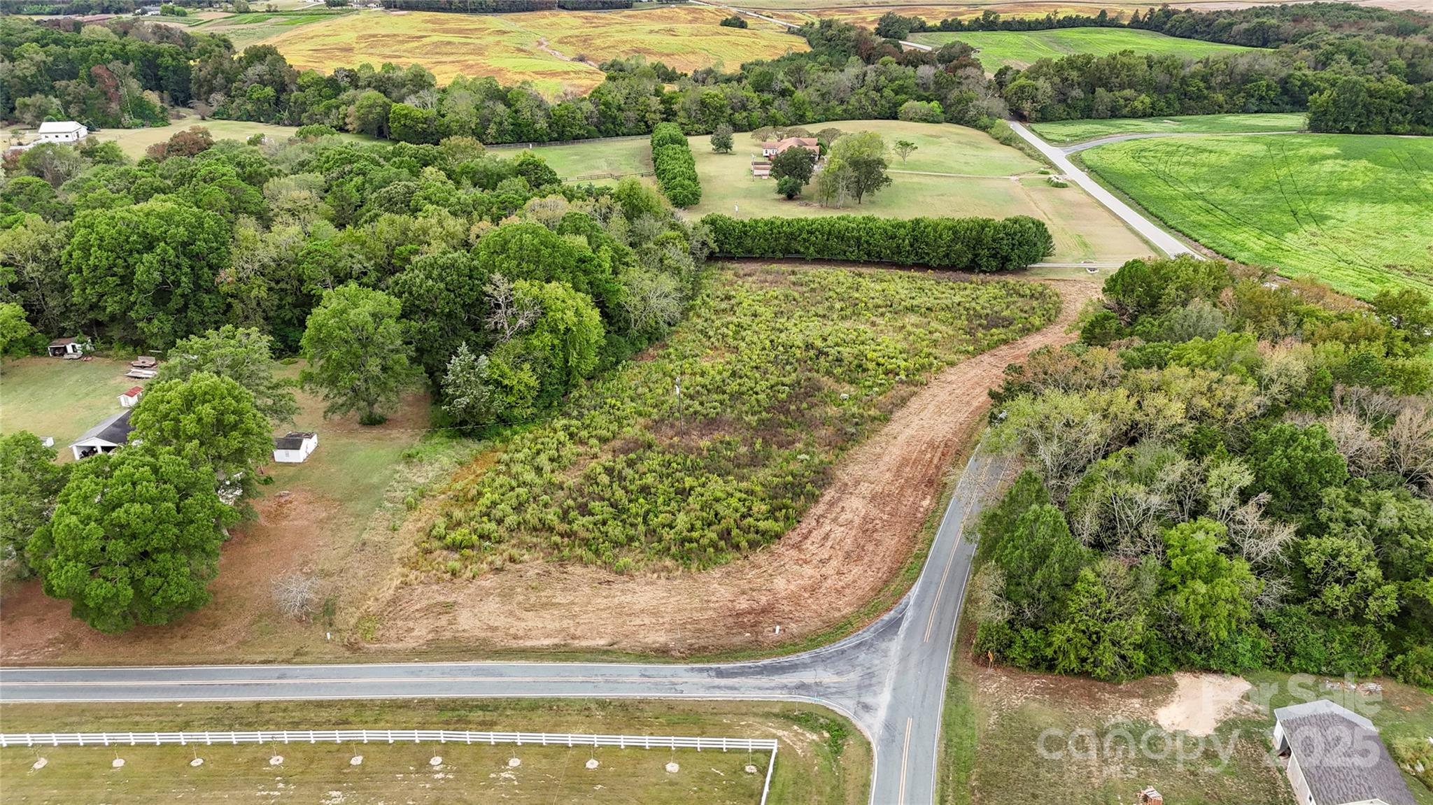 0 Snyders Store Road Wingate, NC 28174 - Photo 17 of 20 a view of a swimming pool with a yard