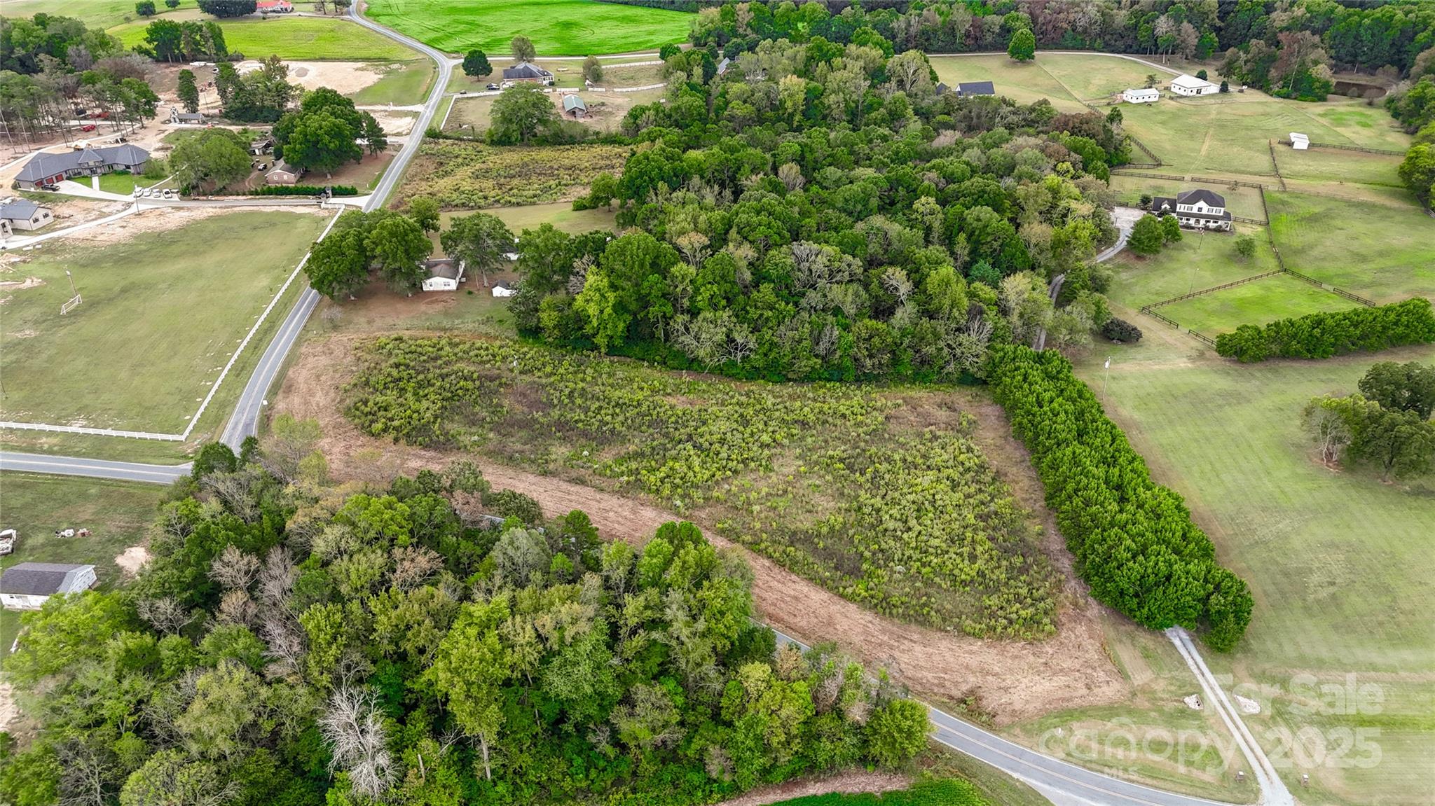 0 Snyders Store Road Wingate, NC 28174 - Photo 2 of 20 a view of a garden with a lake view