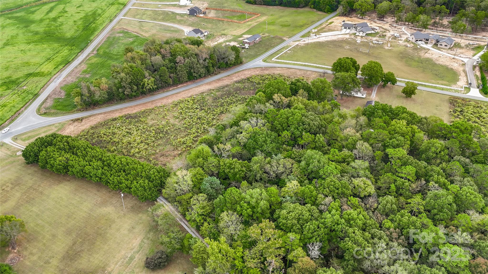 0 Snyders Store Road Wingate, NC 28174 - Photo 9 of 20 a view of a garden with a pathway