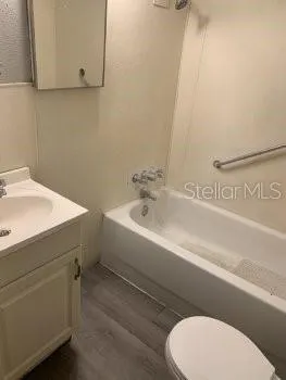 a bathroom with a sink and a toilet