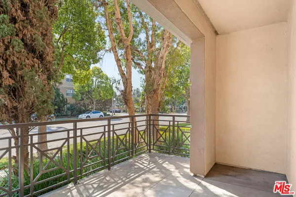 a view of a balcony with lake view
