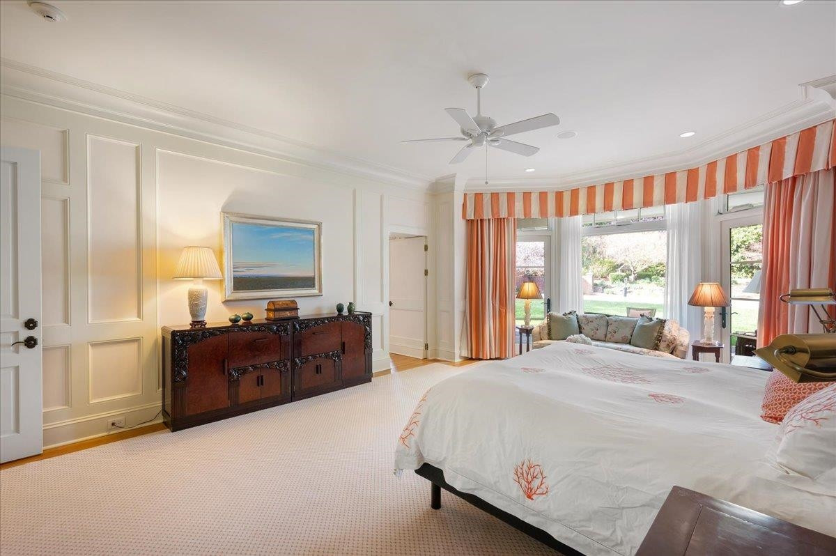 3300 Avon Road Durham, NC 27707 - Photo 25 of 67 a spacious bedroom with a bed and a dresser