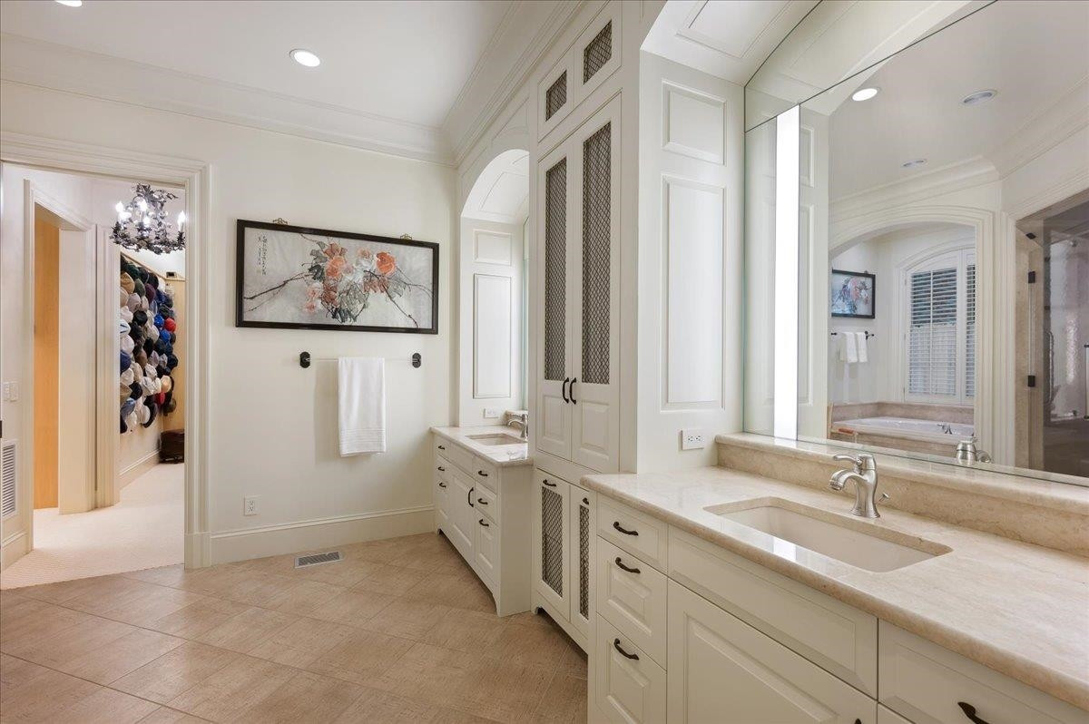 3300 Avon Road Durham, NC 27707 - Photo 26 of 67 a spacious bathroom with double vanity sinks and a shower