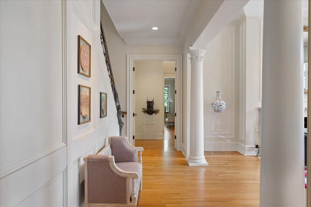 3300 Avon Road Durham, NC 27707 - Photo 30 of 67 a hallway with furniture and wooden floor
