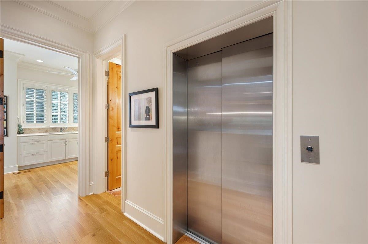3300 Avon Road Durham, NC 27707 - Photo 39 of 67 a view of a hallway with wooden floor