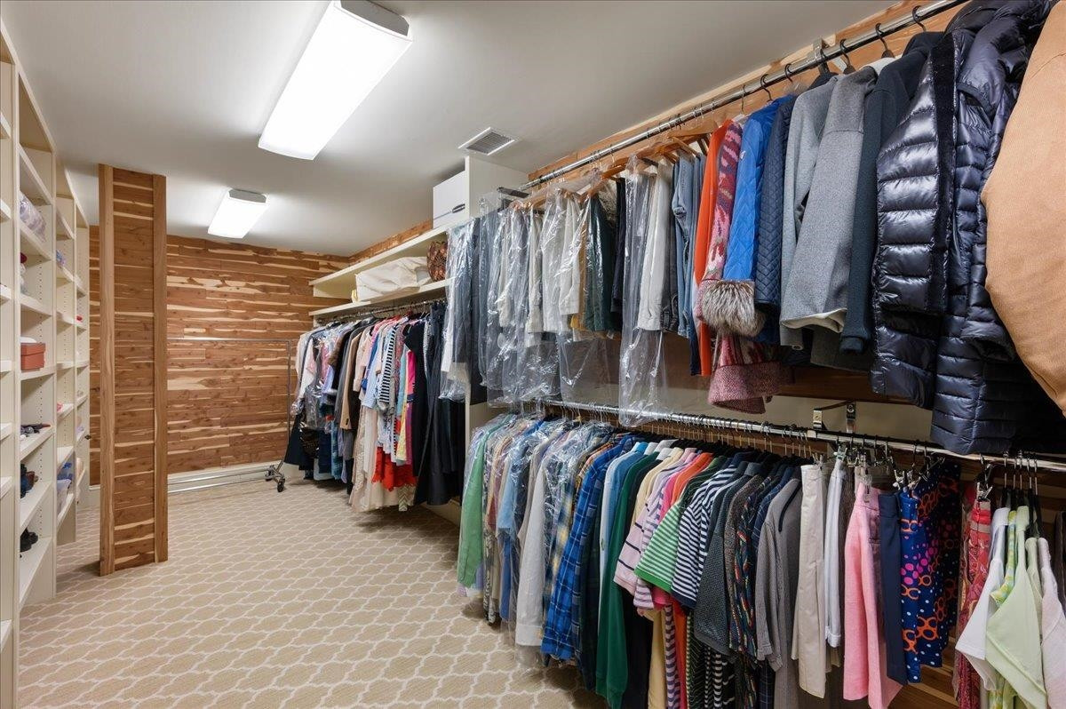 3300 Avon Road Durham, NC 27707 - Photo 44 of 67 a view of walk in closet with clothes