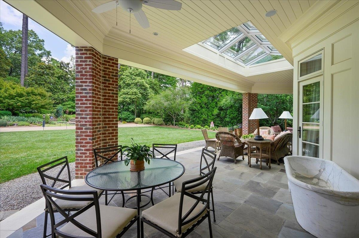 3300 Avon Road Durham, NC 27707 - Photo 48 of 67 a patio with yard table and chairs